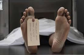 Photo: Missing corpse exhumed, re-buried