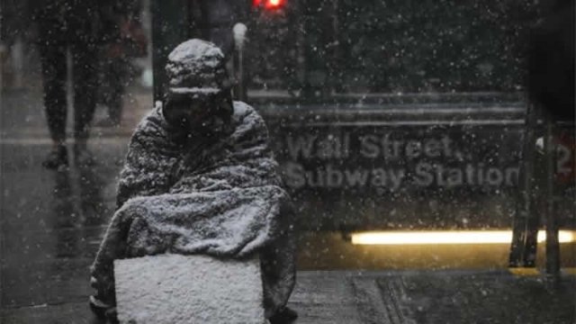 Eight dead as polar vortex clenches U.S.