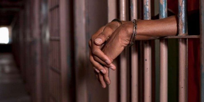 MAN-HANDCUFFS