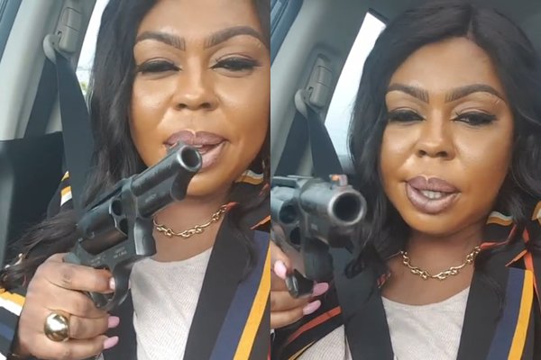 Afia-Schwarzenegger-shows-off-gun.jpg