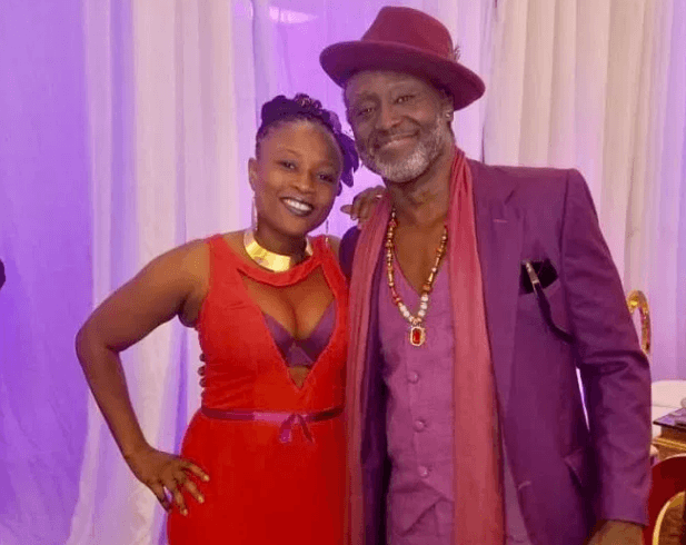 Reggie-Rockstone-with-wife-at-Sarkodie-and-Tracys-white-wedding-held-at-Labadi-Beach-Hotel-in-Accra-on-Saturday-July-21.png