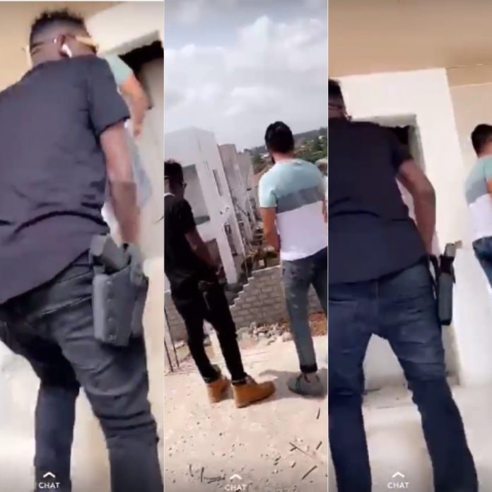 Shatta-Wale-and-his-gun-696x696.jpg