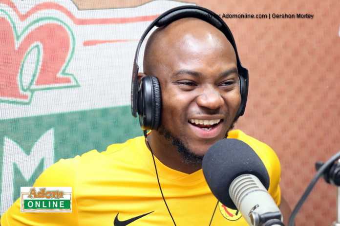 King Promise reveals why he wears big sneakers