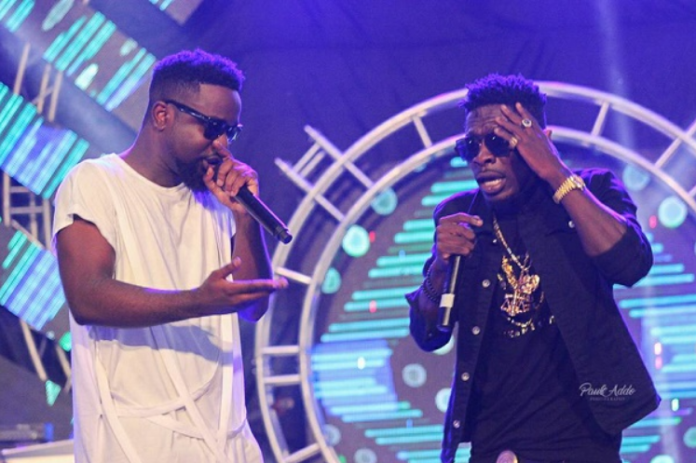 Sarkodie and Shatta Wale Sarkodie (white) and Shatta Wale perform together at a show