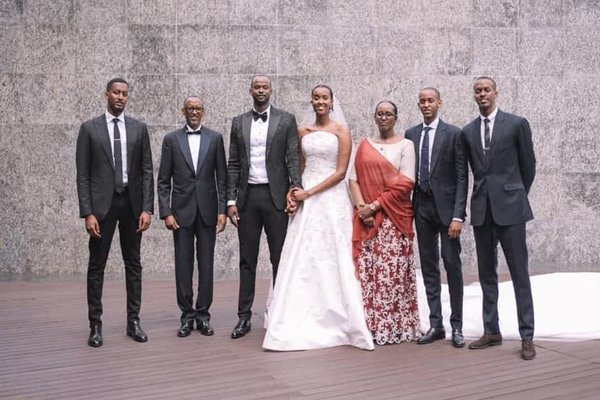 Paul Kagame with his wife and sons at his daughter's wedding. Paul Kagame with his wife and sons at his daughter's wedding.