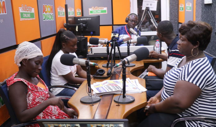 Some of the angry customers in the studios of Adom Fm