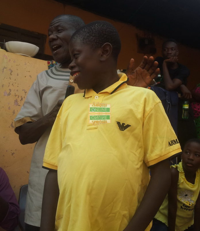 THOMAS NARTEH PARTEY (IN YELLOW POLO SHIRT) IN A SHOT WITH HIS FATHER, MR. WINFRED S. PARTEY Edt. (2)