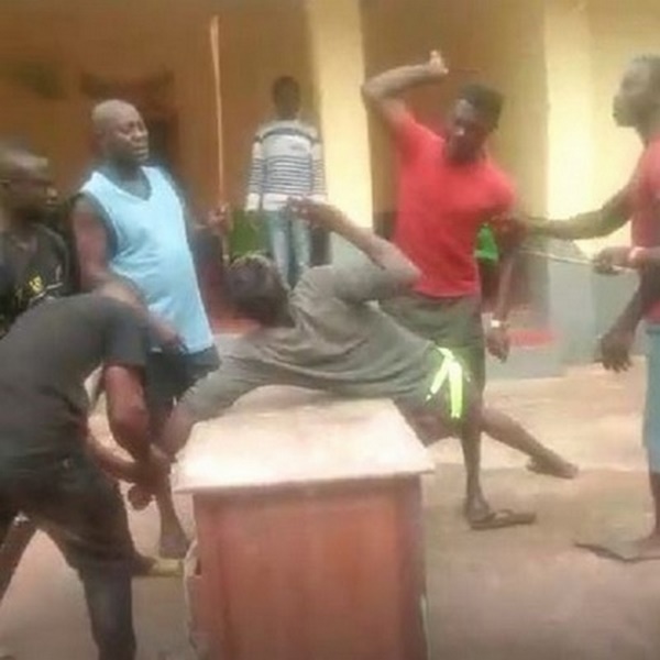 The young man captured being beaten for flouting the chief’s orders The young man captured being beaten for flouting the chief’s orders