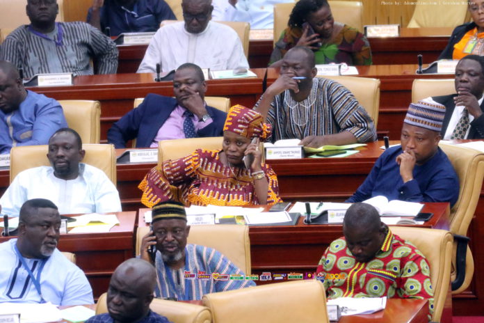 Some Ghanaian MP's on Mobile Phone calls during Mid-Year budget Presentation in parliament _09