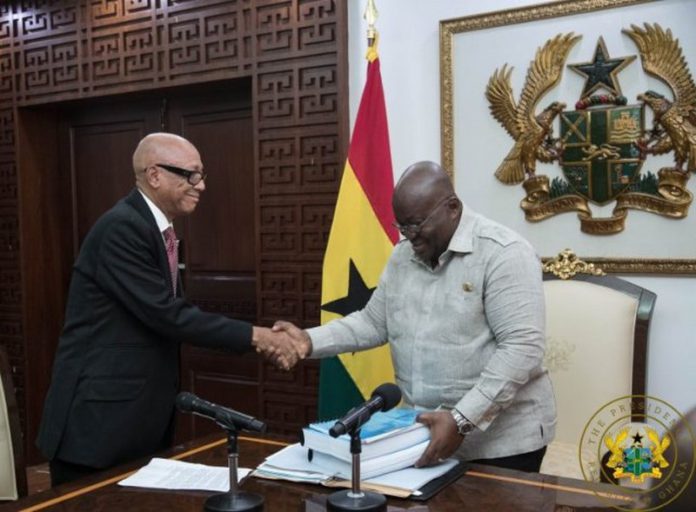 President Akufo-Addo receiving the report from Justice Emile Short President Akufo-Addo receiving the report from Justice Emile Short
