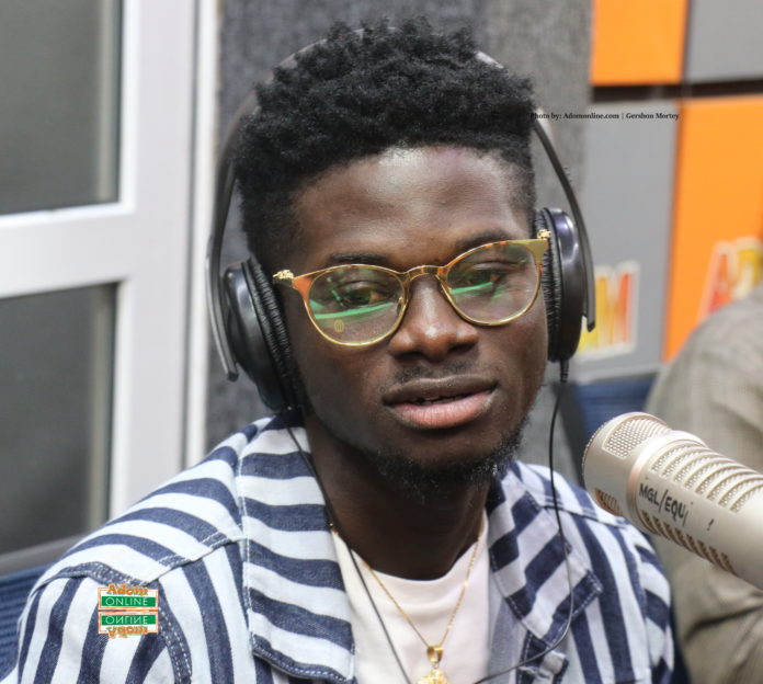 Kuami Eugene at Adom FM Ghanaian Highlife musician, Kuami Eugene says it was all planned out when he said his Zara shoes cost him $700 in an interview