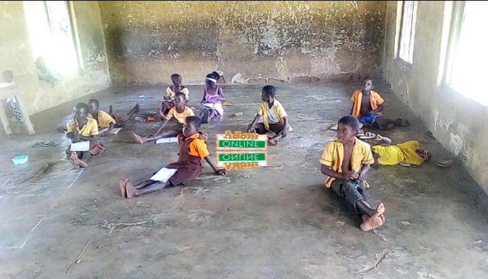 classroom pupils sit on bare floor classroom pupils sit on bare floor