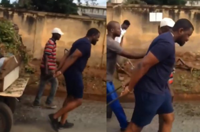 Popular actor and politician John Dumelo has been spotted pushing a refuse truck.