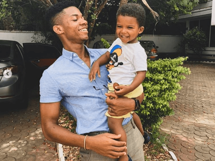 Kidi and his 3-year-old son Kidi and his 3-year-old son