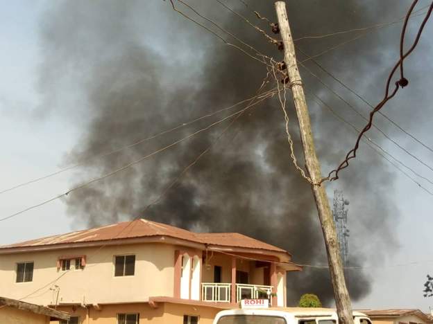 The burning church in Nigeria Witnesses said two of the protesters were shot and wounded by police officers who tried to disperse the angry crowd.