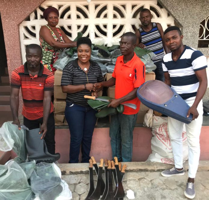 Rachel Appoh handing over the items to the leadership of Gomoa Youth in Agric Rachel Appoh handing over the items to the leadership of Gomoa Youth in Agric