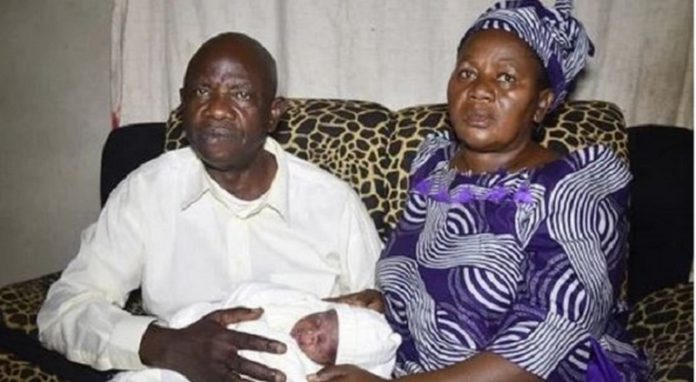 Mrs. Dorcas Osiebo with husband and new the born baby Mrs. Dorcas Osiebo with husband and new the born baby