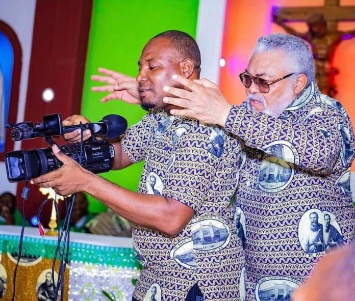 Rawlings directs cameraman on set