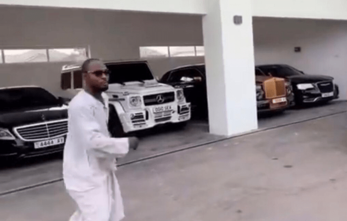 Funny Face choosing a car of his choice at Adebayor's home Funny Face choosing a car of his choice at Adebayor's home
