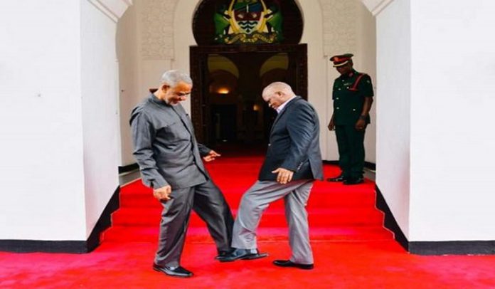 Coronavirus: Tanzania's president prefers foot greeting Coronavirus: Tanzania's president prefers foot greeting