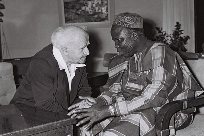 Chief S L Akintola Prime minister of western Nigeria in conversation with the prime minister of Isra Chief S L Akintola Prime minister of western Nigeria in conversation with the prime minister of Isra