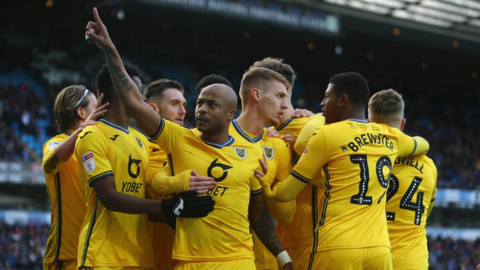 Andre Ayew with Swansea City teammates Andre Ayew with Swansea City teammates