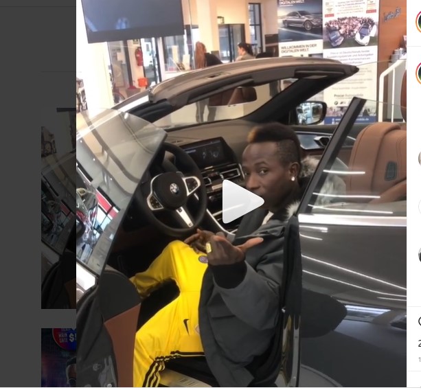 Patapaa in his new BMW car
