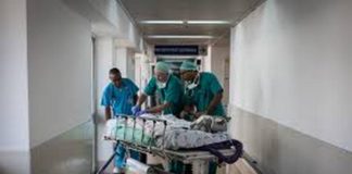 Doctors attending to a patient