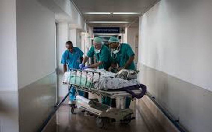 coro (Copy) Doctors attending to a patient