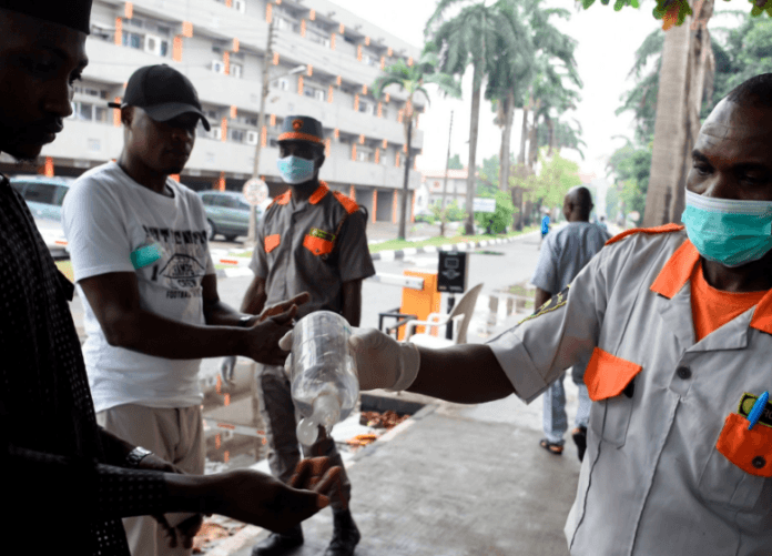 A security guard administering sanitizer to a hospital visitor in Lagos, Nigeria, on Friday.Credit...Pius Utomi Ekpei/Agence France-Presse — Getty Images A security guard administering sanitizer to a hospital visitor in Lagos, Nigeria, on Friday.Credit...Pius Utomi Ekpei/Agence France-Presse — Getty Images