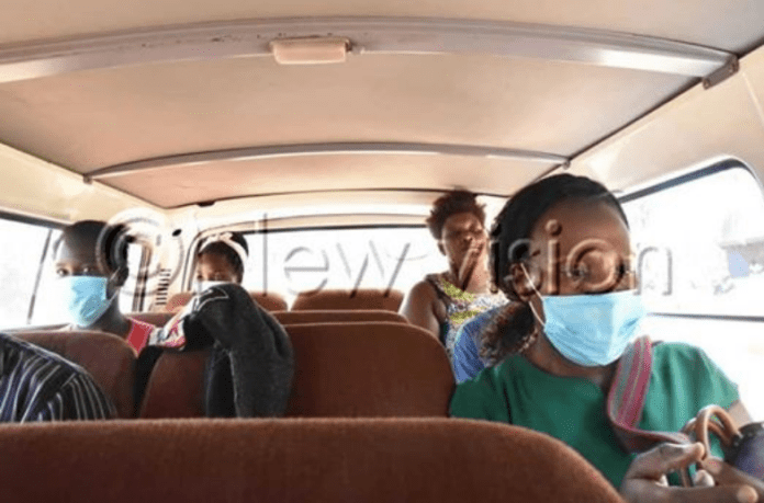 Commercial drivers in Uganda carry 2 passengers per row Commercial drivers in Uganda carry 2 passengers per row