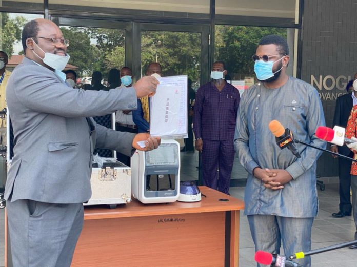 Director of Noguchi, Professor Abraham kwabena Annang accepting the donation and posing with Gregory Rockson, CEO of Pharma. Director of Noguchi, Professor Abraham kwabena Annang accepting the donation and posing with Gregory Rockson, CEO of Pharma.