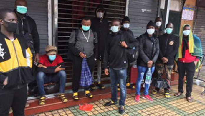 EVICTED-Some-of-the-evicted-Africans-stranded-in-front-of-their-hotels-and-aprtments-390x220 (Copy)