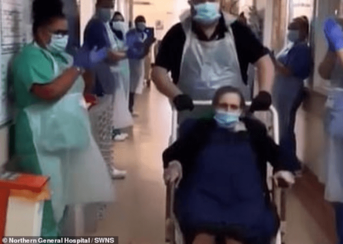 A heartwarming video shows the moment Vera Beeley, 102, from Sheffield, leaves hospital after defeating coronavirus (pictured) A heartwarming video shows the moment Vera Beeley, 102, from Sheffield, leaves hospital after defeating coronavirus (pictured)