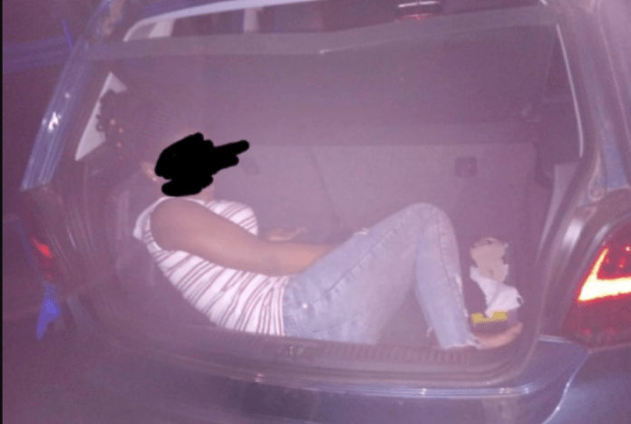 Man arrested for attempting to smuggle his girlfriend in his car booth Man arrested for attempting to smuggle his girlfriend in his car booth