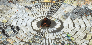 Kanye West surrounded by hundreds of Yeezys