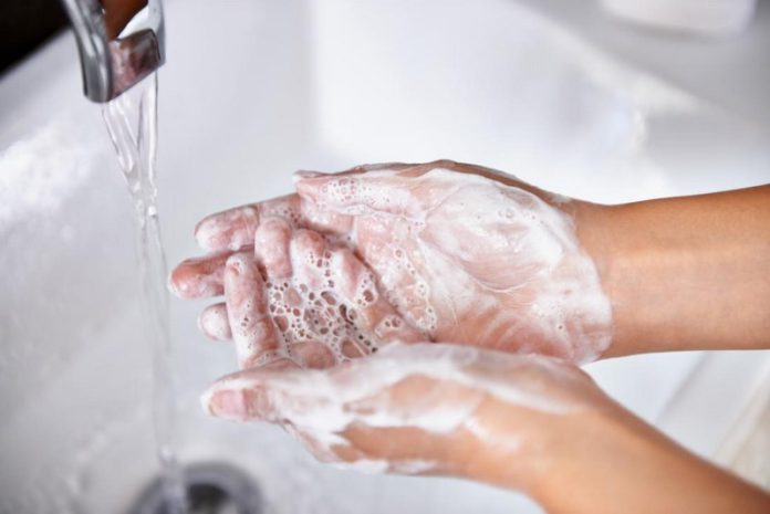 person-washing-their-hands-with-soap (Copy) hand washing