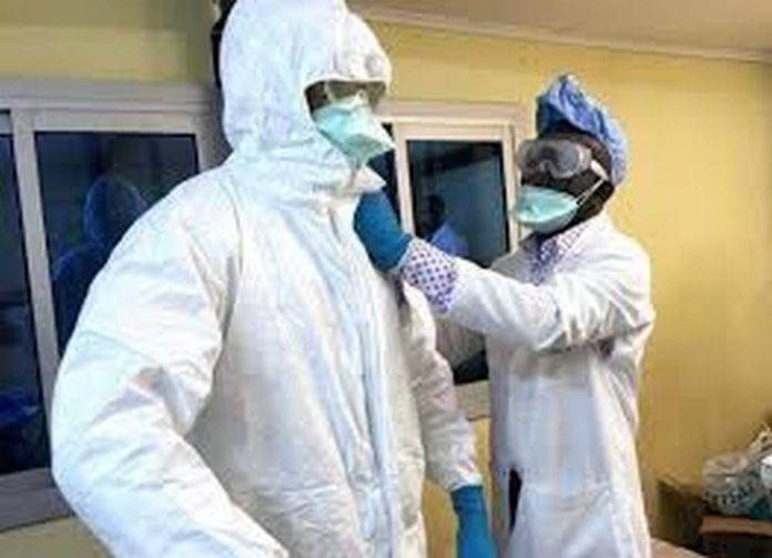 ppe (Copy) Health Workers putting on Personal Protective Equipment (PPE)