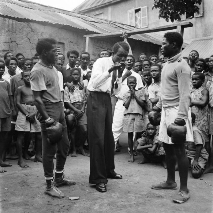 roy Roy Ankrah with two amateur boxers
