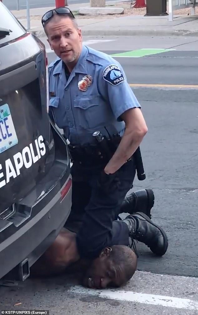 Kellies-lawyers-said-that-she-was-devastated-by-Floyds-death.-Derek-Chauvin-in-uniform-is-shown-here-in-a-still-from-a-video-taken-Monday-when-he-knelt-on-Floyds-neck-during-an-arrest
