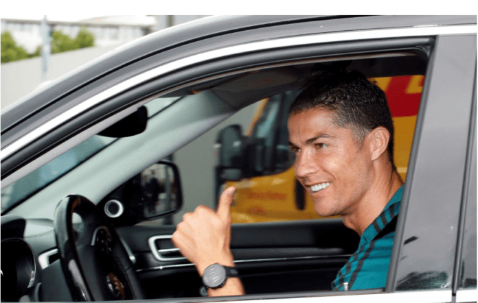 Juventus' Cristiano Ronaldo gestures as he leaves Juventus Training Center following the outbreak of the coronavirus disease (COVID-19), Turin, Italy, May 19, 2020. REUTERS/Alessandro Garofalo/File Photo