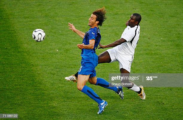 HANOVER, GERMANY - JUNE 12: Samuel Kuffour of Ghana thwarts the progress of Alberto Gilardino of Italy during the FIFA World Cup Germany 2006 Group E match between Italy and Ghana played at the Stadium Hanover on June 12, 2006 in Hanover, Germany. (Photo by Shaun Botterill/Getty Images) HANOVER, GERMANY - JUNE 12: Samuel Kuffour of Ghana thwarts the progress of Alberto Gilardino of Italy during the FIFA World Cup Germany 2006 Group E match between Italy and Ghana played at the Stadium Hanover on June 12, 2006 in Hanover, Germany. (Photo by Shaun Botterill/Getty Images)
