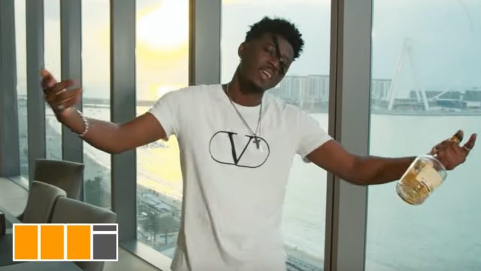 Rapper Kwesi Slay in "Billionaire" music video Rapper Kwesi Slay in "Billionaire" music video