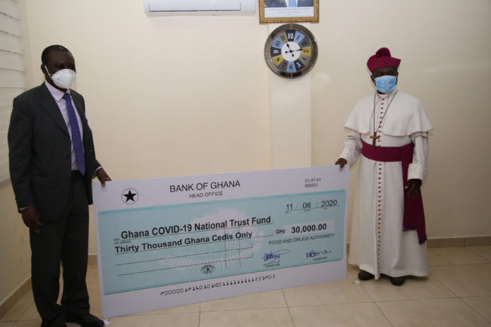 1.-Justice-Akrofi-right-a-member-of-the-COVID-19-Trust-Fund-receiving-a-cheque-for-Ghs30000-from-Dr-Sammy-Ohene-Board-Chairma-Food-and-Drugs-Board