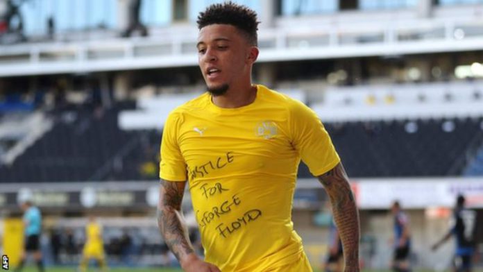 Jadon Sancho took off his shirt in the 57th minute after scoring for Borussia Dortmund Jadon Sancho took off his shirt in the 57th minute after scoring for Borussia Dortmund