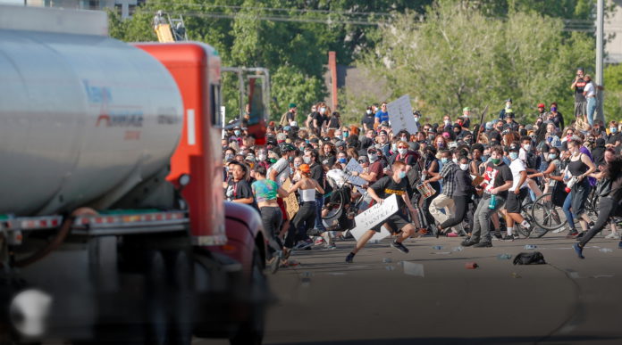 Truck drives into Minneapolis protesters