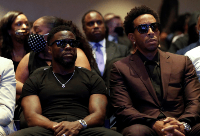 Actor Kevin Hart and musician Ludacris are seen during a memorial service for George Floyd today.REUTERS Actor Kevin Hart and musician Ludacris are seen during a memorial service for George Floyd today.REUTERS