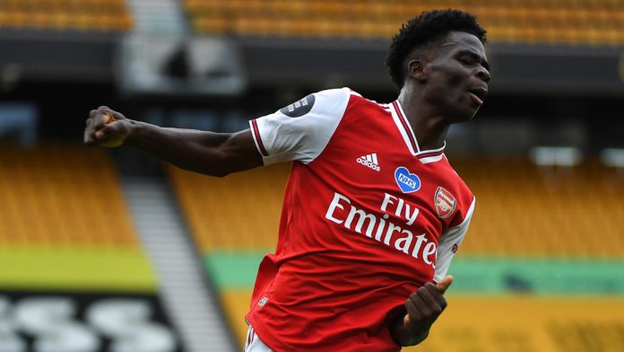 Bukayo Saka of Arsenal celebrates after scoring a goal to make it 0-1 during the Premier League match between Wolverhampton Wanderers and Arsenal FC at Molineux on July 4, 2020 Image credit: Getty Images Bukayo Saka of Arsenal celebrates after scoring a goal to make it 0-1 during the Premier League match between Wolverhampton Wanderers and Arsenal FC at Molineux on July 4, 2020 Image credit: Getty Images