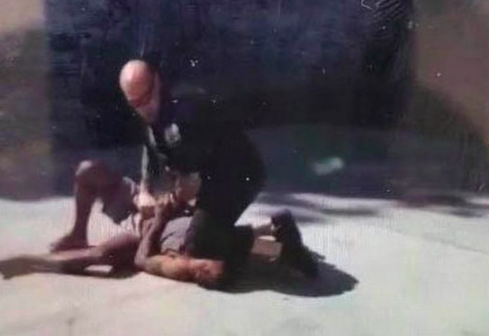 police kneel on man police kneel on man