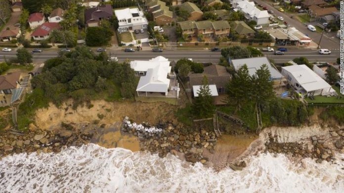CENTRAL COAST, AUSTRALIA - JULY 17: An aerial view of the coastal erosion to local homes in the suburb of Wamberal on July 17, 2020 in Central Coast, Australia. Beachfront homes along the NSW Central Coast are at risk of collapse due to beach erosion after huge swells hit the states beaches on Thursday. (Photo by James D. Morgan/Getty Images) CENTRAL COAST, AUSTRALIA - JULY 17: An aerial view of the coastal erosion to local homes in the suburb of Wamberal on July 17, 2020 in Central Coast, Australia. Beachfront homes along the NSW Central Coast are at risk of collapse due to beach erosion after huge swells hit the states beaches on Thursday. (Photo by James D. Morgan/Getty Images)